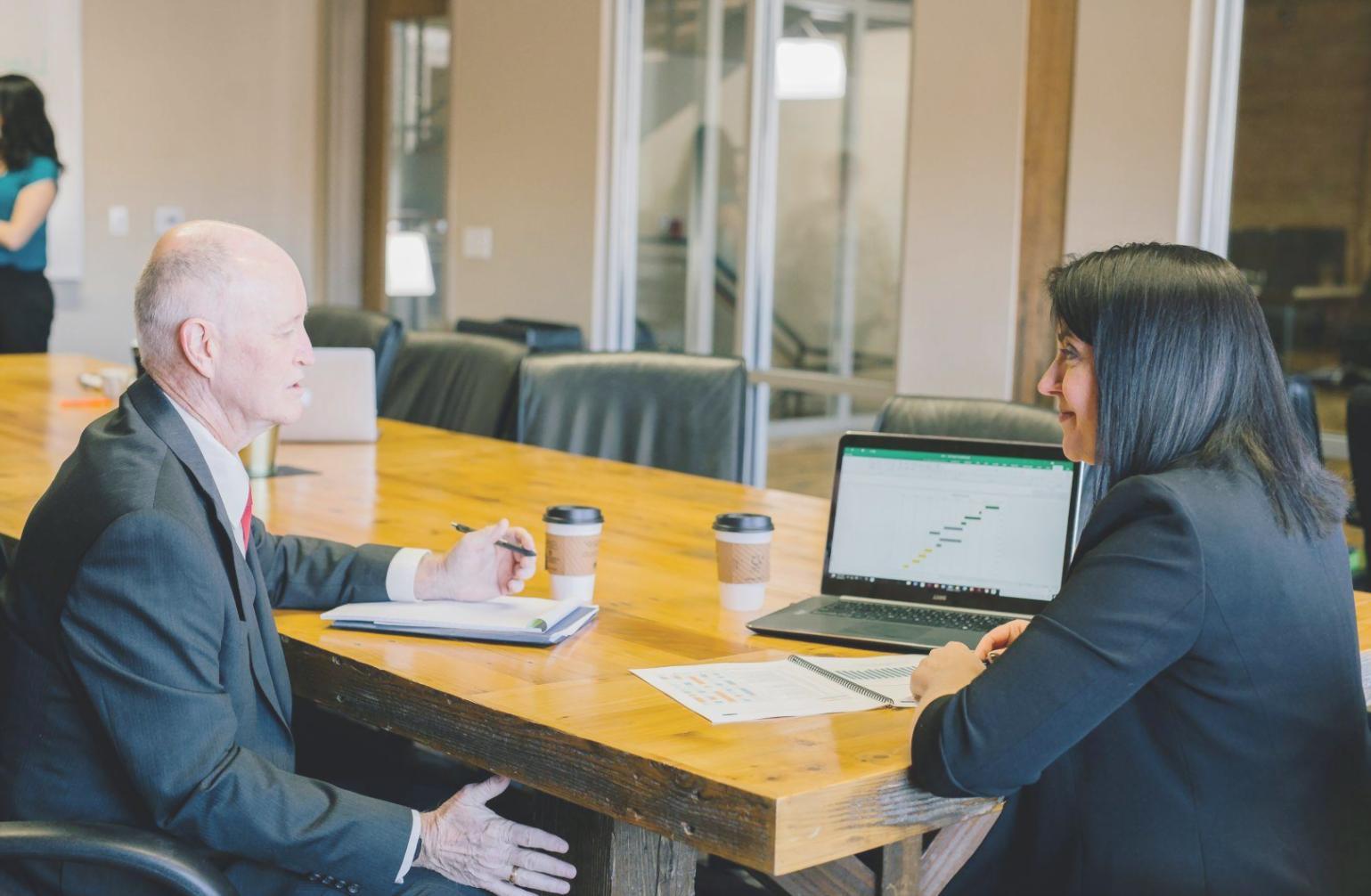 Digital banking security training session with professionals reviewing cybersecurity protocols